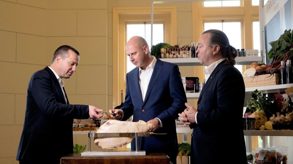 David Jones CEO John Dixon (centre) says food provides a "halo" effect as it brings in shoppers who can have a coffee and a meal, then browse through the rest of the store.