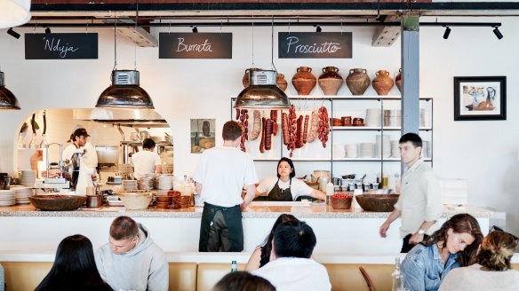 The dining room of the newly opened Totti's Lorne is bright and beachy.