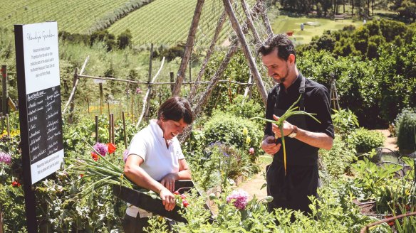 Bursting into bloom: Head gardener Julie Bennett and chef Gerard Phelan in Montalto Estate's three-hectare garden.