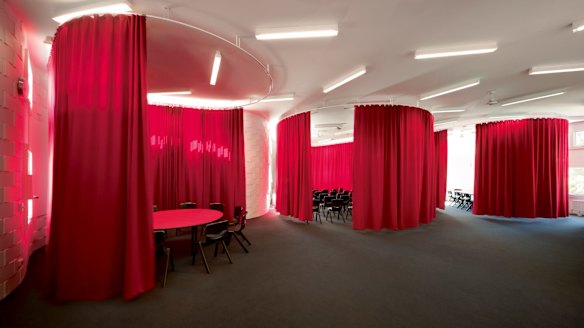 At Fitzroy High School, architects McBride Charles Ryan used heavy wool curtains to create small focused rooms.