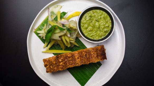 Rotisserie pork belly with fennel pickle and scud chilli death sauce.