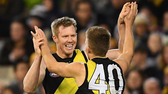 Tails up: Richmond's Jack Riewoldt and Dan Butler.