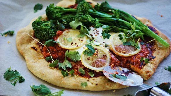 Spicy harissa, broccolini and lemon pizza with cooling whipped feta.