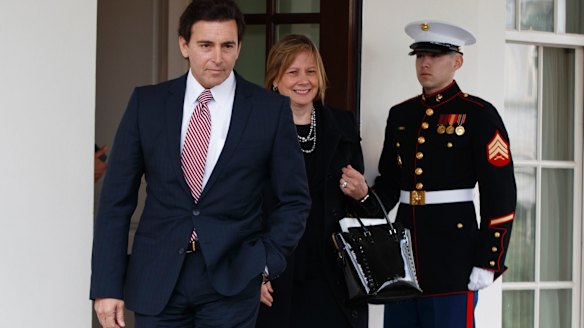 Ford Motors CEO Mark Fields, left, and General Motors CEO Mary Barra outside the White House in Washington.