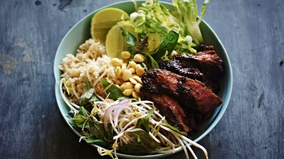 Black pepper and kaffir lime beef bowl with coconut rice and salad.