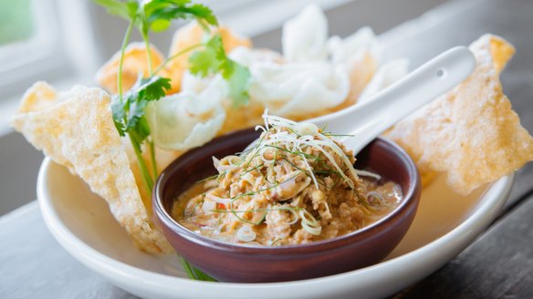 Chicken simmered in coconut cream with cassava crackers at E.P. & L.P. 

