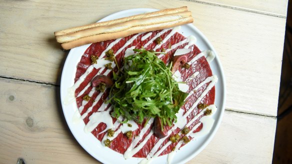 'Beef carpaccio' with grissini. 