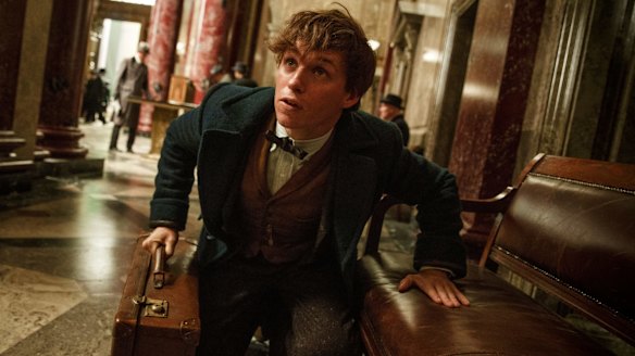 Eddie Redmayne as Newt Scamander with his "amazing" suitcase. 