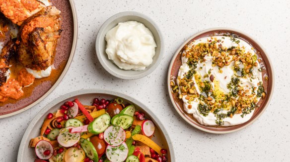 Harissa spatchcock, garlic toum, fattoush salad and labneh with oregano, pistachio and green olives at Zaffi.