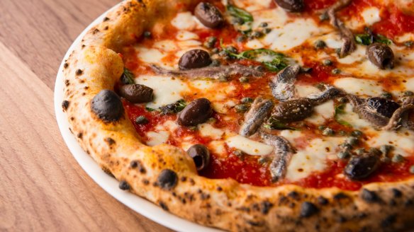 The classic napoletana carries no more than tomato, fior di latte, capers, olives and anchovies.