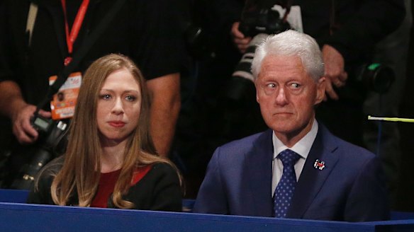 Former President Bill Clinton, with daughter Chelsea, looked uneasy throughout the debate.