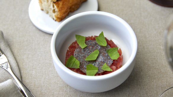 Go-to dish: Yellowfin tuna with oxheart tomato, burrata and basil.