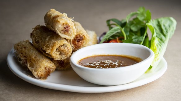Deep-fried crab net rolls with blistered seafood. 
