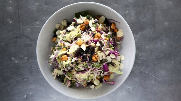 The Greekslaw is a crunchy, sweet and fresh mini mountain of cabbage, parsley, almonds and currants with a lemon garlic dressing. 
