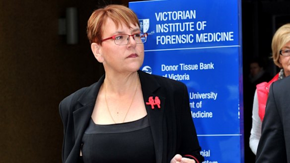 Peta Barnes leaves the Coroners Court of Victoria in July after hearings on her daughter's death.