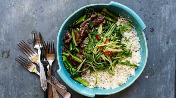 Sticky beef stir-fry with optional shredded green mango salad.