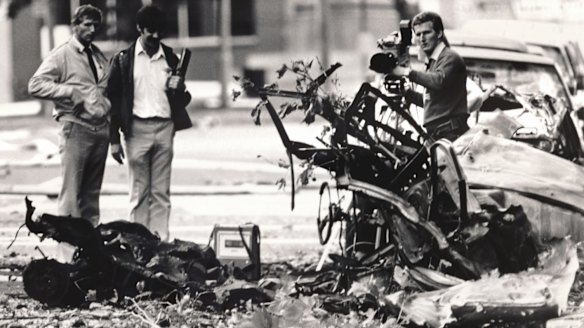 Investigators at the scene of the bombing.