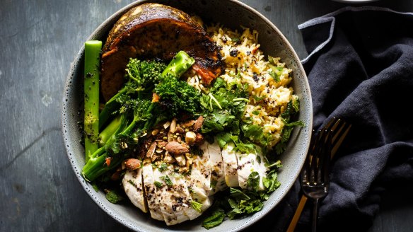 Middle Eastern rice bowl with chicken poached in almond milk.