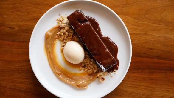 Warm chocolate olive oil cake with vanilla ice-cream and dulce de leche. 