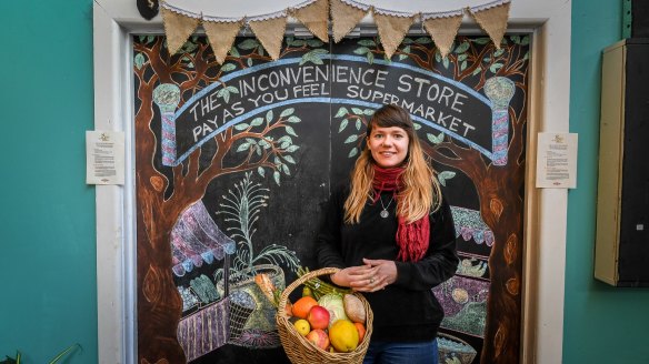 Fighting food waste while you're shopping: Project manager Astrid Ryan at the doors to The Inconvenience Store behind the Lentil As Anything restaurant in Thornbury.