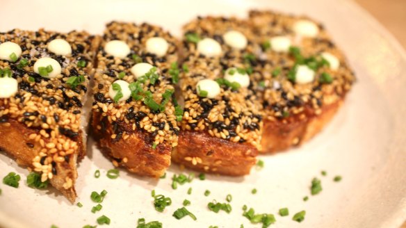 Next-level prawn toast with sesame seeds and yuzu mayonnaise.