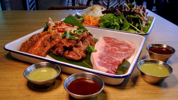 Barbecue sets come with vermicelli, Vietnamese mint and greens.