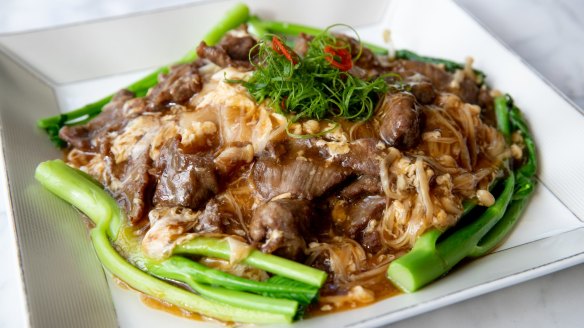 Wok-fried flat rice noodles with sliced wagyu, ginger, onion, bean sprouts and garlic. 