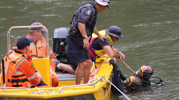 Police divers search the Murrumbidgee River in Wagga on Thursday, after Peter Abd-El-Kaddous went missing.