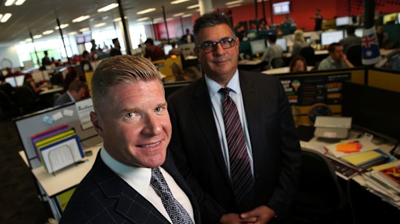 Acquire Learning Group Managing Director John Wall and the company's former advisory council chair Andrew Demetriou in November 2014.
