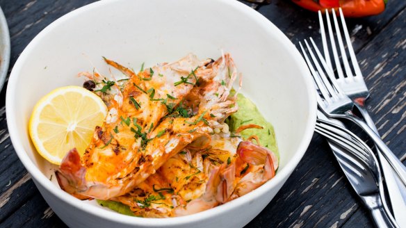 Confit garlic and chilli barbecue prawns with buttermilk, avocado and parsley recipe.