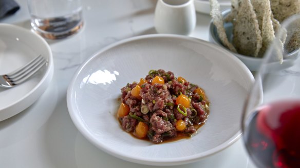 Beef tartare infused with smoked soy and bonito.