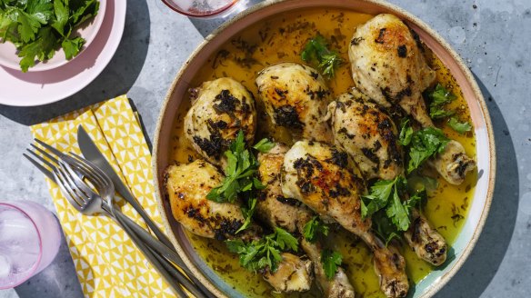 Slow-roasted chicken drumsticks with butter and sage.