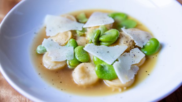 Coin-shaped anolini pasta with broad beans, parmesan and pecorino.