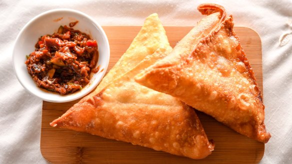 Sambosa, the Ethiopian version of samosa, with chutney.