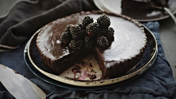 Glossy chocolate ganache and blackberry tart.