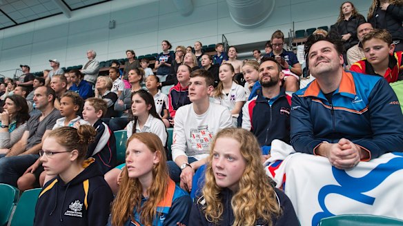 Supporters gather at MSAC in Albert Park to watch Mack Horton's medal bid.