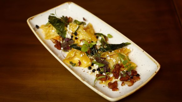 Prawn manti with candied walnuts and fried mint leaves at 1821.