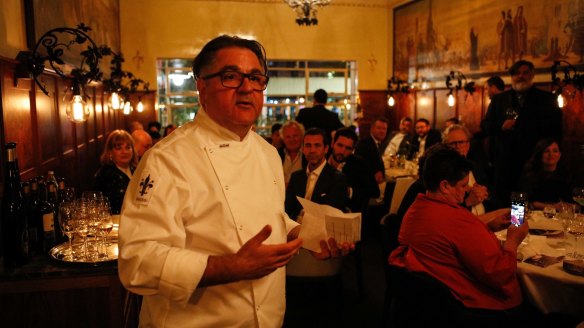 Chef-restaurateur Guy Grossi addresses invited guests at a dinner in Grossi Florentino's Mural Room to celebrate the restaurant's 90th anniversary.