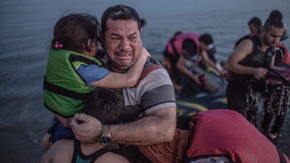 This photo of Syrian refugee Laith Majid and his children struck a chord with thousands around the world.