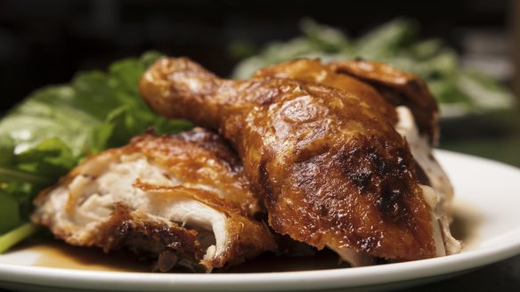 Crisp-skinned half-smoked chicken.