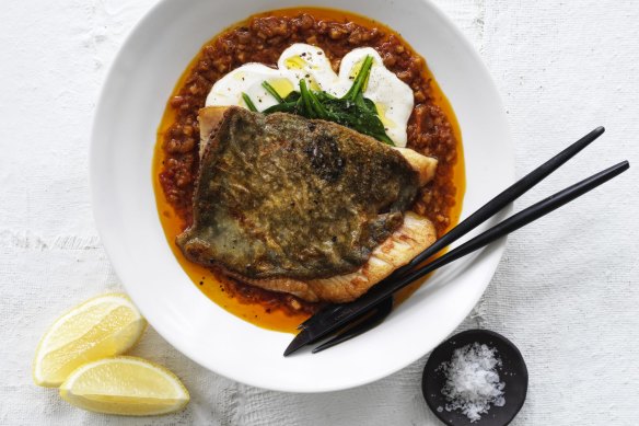 John Dory fillets with tomato cardamom sauce.