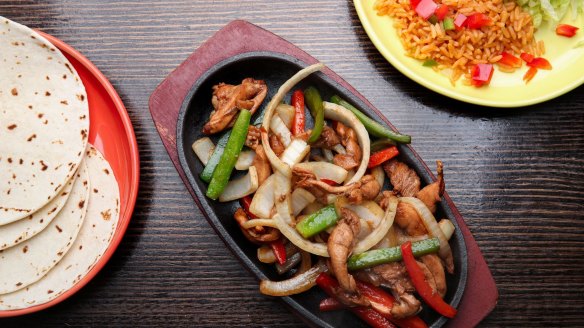 Fajitas, a Taco Bill signature dish.