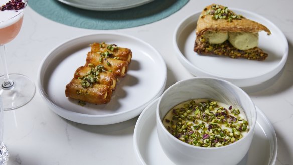 Desserts include ladies fingers filled with clotted cream (left) and mahalabia (milk pudding, front).