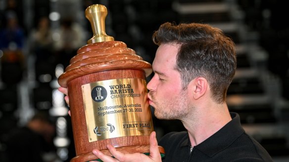Anthony Douglas kisses his winning trophy.