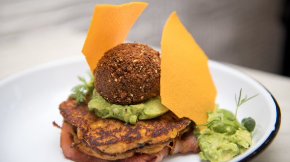 Truffled sweet potato and corn fritters with dukkha-coated son-in-law egg, smashed avo, bacon and corn tuille at Be the Duck.