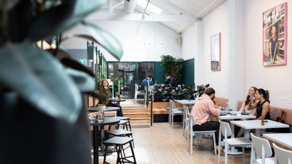 Lobbs cafe, Brunswick, features high ceilings, timber flooring and a subtle pastel palette.