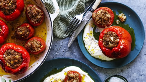 Tomatoes and capsicums stuffed with spiced rice, dried mint and halloumi.