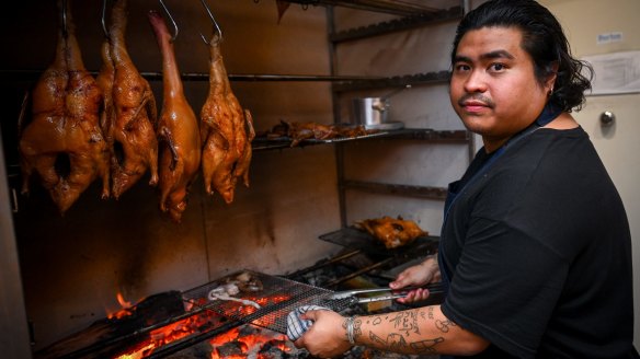 Chef Ross Magnaye in his fire-stoked kitchen.