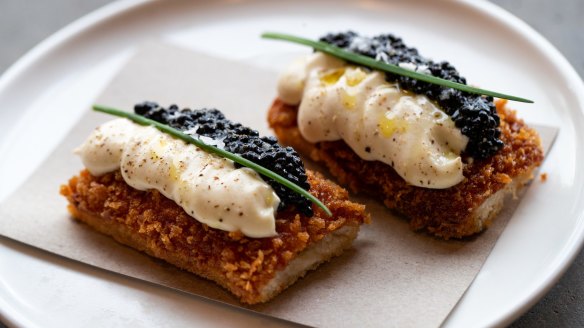 Prawn toast topped with cauliflower cream and avruga caviar.