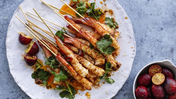 Prawn skewers with lemon myrtle butter and blood limes (right).